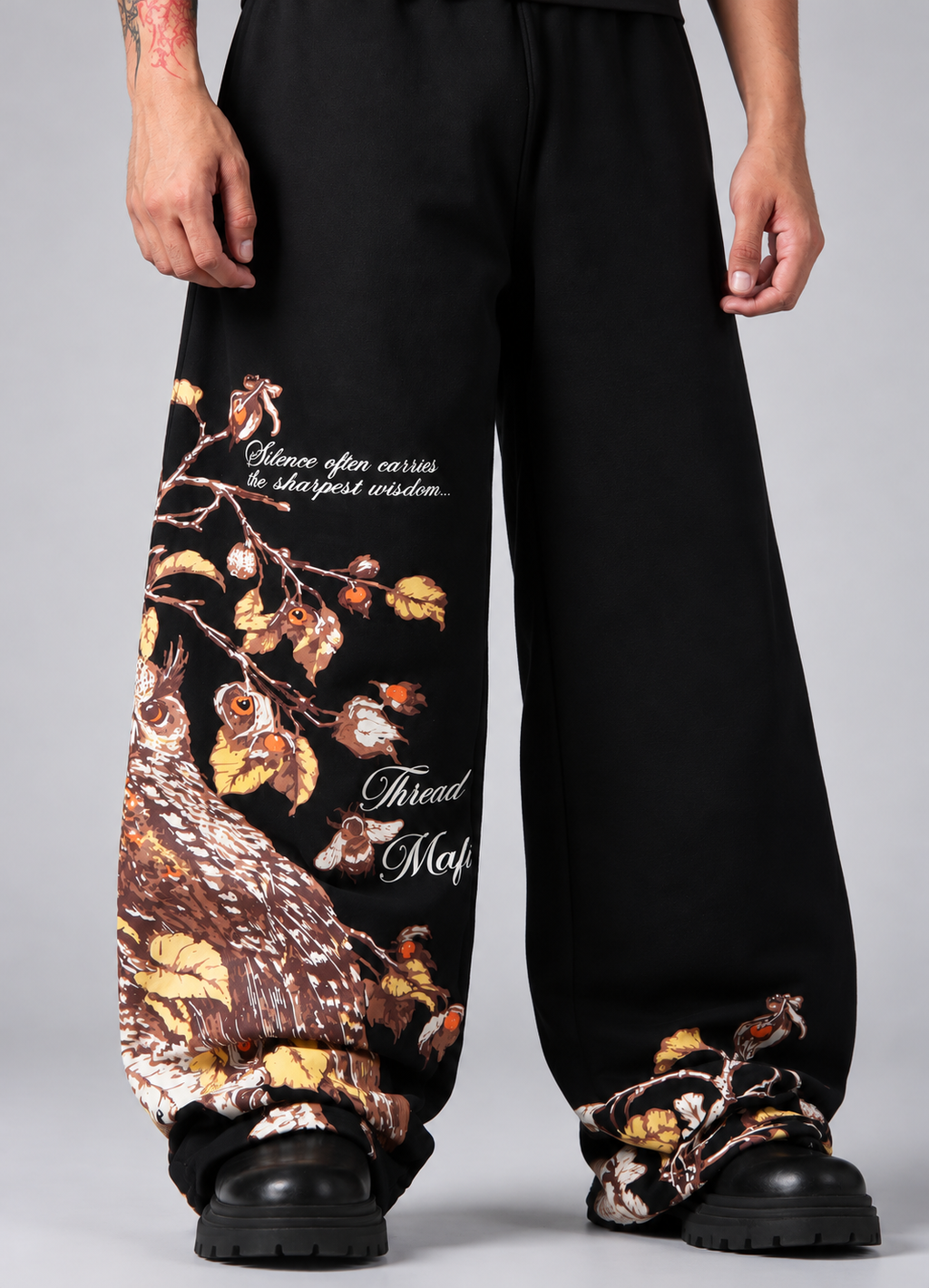 Silent Wisdom Wide-Leg Graphic Pants – Black