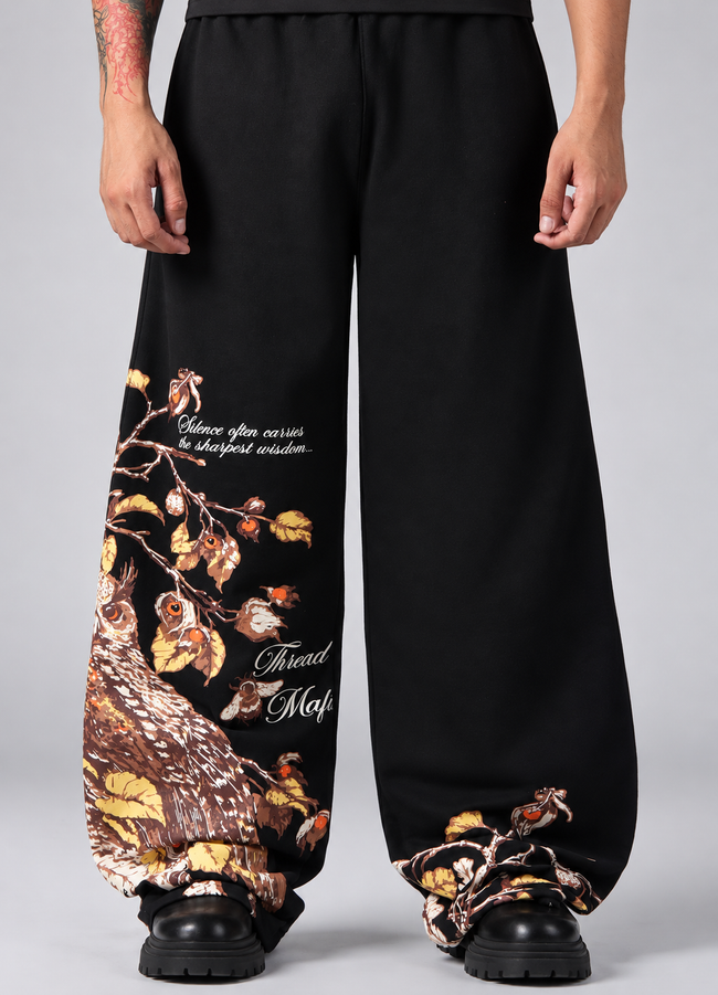 Silent Wisdom Wide-Leg Graphic Pants – Black